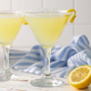 Closeup view of a lemon drop mocktail in a martini glass.