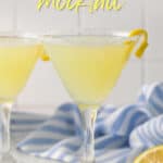 Front view of a lemon drop mocktail in a martini glass. Overlay text is at the top of the image.